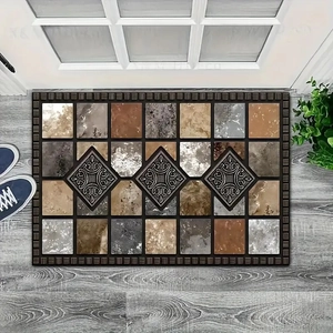 Detailed stone pattern floor mat with diamond accents on gray wooden floor by door