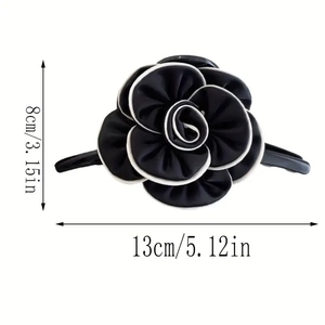 Detail showing dimensions of the black and white fabric camellia flower hair clip