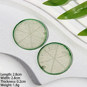 Détails des dimensions de la tranche de citron en résine de 2,8 cm et texture verte