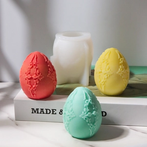 Detailed relief pattern on Easter egg silicone mold with colorful wax finished products
