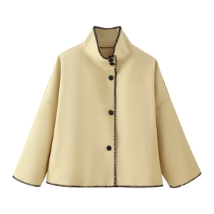 Women's cream wool coat with a stand collar, drop shoulders, and black embroidery trim
