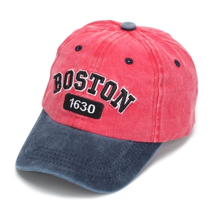 Detail view of the embroidered BOSTON 1630 text and washed cotton texture on kids cap