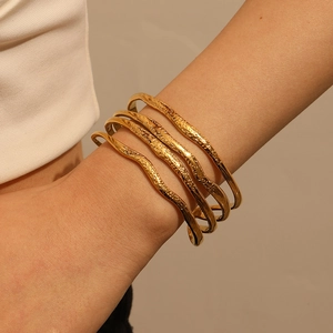 Golden wavy hammered texture stainless steel open bangles for women in layered style