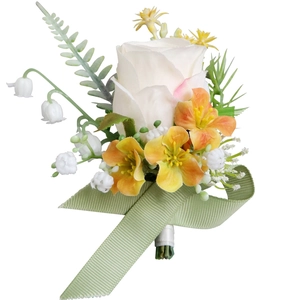Elegant white rose wedding boutonniere with green fern leaves and a light green ribbon