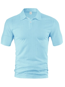 Detail of light blue short-sleeved polo shirt showing breathable textured fabric and M size