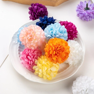 Colorful artificial silk hydrangea balls in a white tray for wedding and DIY decoration