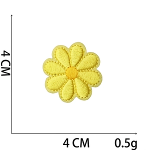 Detailed embroidery patch of yellow daisy flower measuring 4cm by 4cm for clothes