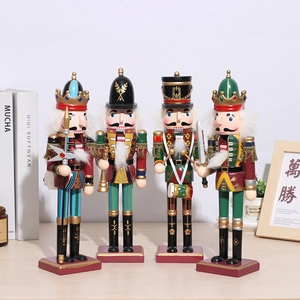 Close-up of four wooden nutcracker figures with velvet beards and painted details