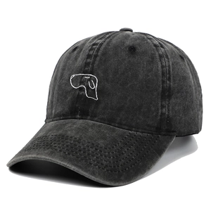 Detail of vintage washed grey baseball cap featuring a minimalist white dog embroidery