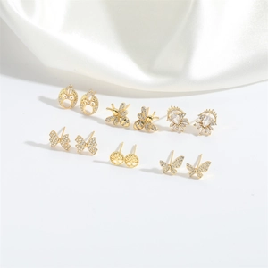 6-pair gold earring set featuring bee butterfly and tree of life with sparkling zircons