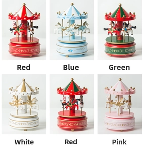 Collection of carousel music boxes in six colors featuring painted star and wave patterns