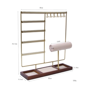 Golden metal jewelry organizer stand with wood base for earrings and necklaces