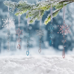6PCS clear blue and pink acrylic crystal snowflake ornaments hanging on snowy pine branches