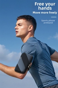 Close-up of a runner wearing a gray breathable arm bag for sports and fitness