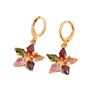Elegant gold earrings with colorful star-shaped crystals and lucky star drop design