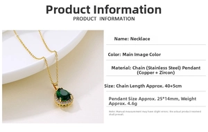 Detail of water drop emerald zircon pendant on gold stainless steel chain necklace