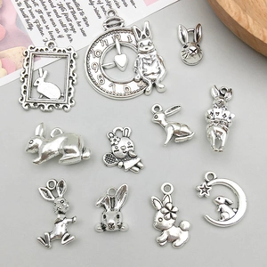 Set of 11 antique silver rabbit charms in diverse designs for DIY jewelry making