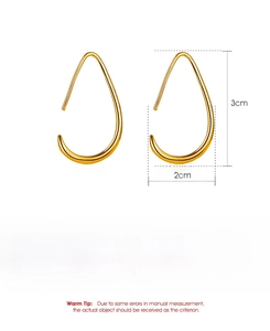 Detail view of gold teardrop earrings with precise 3cm x 2cm size specifications