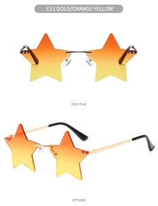 Detail of star-shaped sunglasses with gold temples and orange yellow gradient lenses