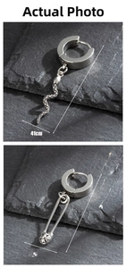 Silver gothic earrings featuring detailed snake and paperclip pendants on stone