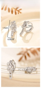 Macro detail of heart-shaped hoop earring with dimensions showing pave-set zircon stones