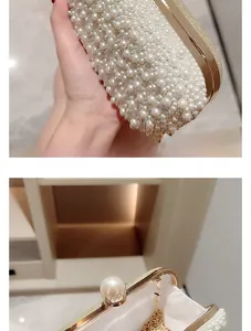 Close-up of luxury pearl evening clutch with ornate metal frame and sphere clasp
