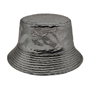 Detailed close-up of the shiny silver metallic grid pattern on a stylish bucket hat