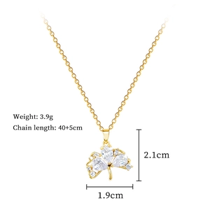 Detail showing dimensions of golden ginkgo leaf necklace with sparkling crystals