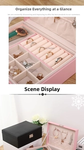 Detail view of large capacity jewelry box with necklace hooks and ring storage slots