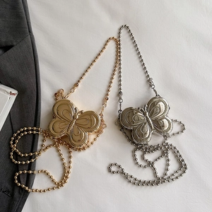 Mini butterfly shaped metal crossbody bags in gold and silver with elegant bead chain straps
