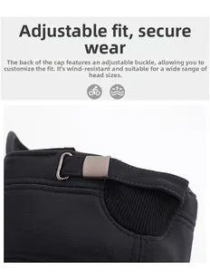 Detail of winter flat cap with adjustable dark metal buckle and twill fabric texture