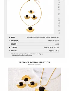Detail of vintage fan-shaped gold jewelry set with black square gems and hammered metal