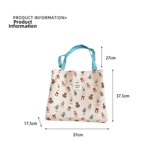 Detailed dimensions of beige canvas tote bag with cute bear patterns and blue handles