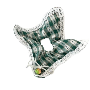 Green and white checkered scrunchie with lace edge and lemon bead charm on white background
