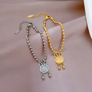 Titanium steel rabbit bracelet with cat eye stone beads in gold and silver finish