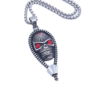 Vintage Indian style skull pendant necklace with red rhinestone eyes and silver steel chain