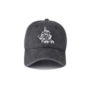 Detail of a dark gray washed cotton baseball cap with a cute cat head embroidery on the front