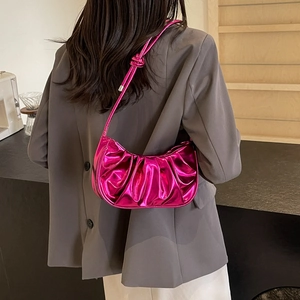 Glossy metallic fuchsia pleated cloud shoulder bag with thin strap for women