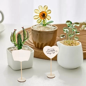 Three-piece set of decorative glass succulents and cacti in ceramic pots for home decor