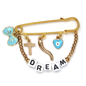 Golden safety pin brooch with blue evil eye heart, cross, and DREAM letter beads