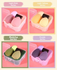 Detail of four colorful makeup sponge sets including teardrop and mushroom shapes in cases