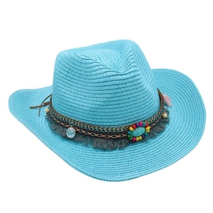 Detailed close-up of a turquoise blue woven straw cowboy hat with ethnic beaded band.