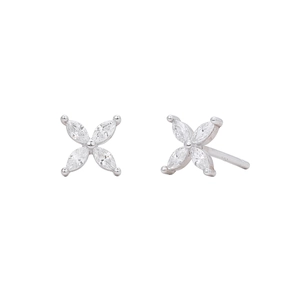 Macro detail of 925 sterling silver stud earrings featuring zircon flower petals