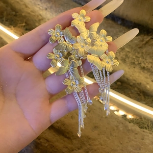 Silver needle crystal butterfly flower tassel earrings with golden floral elements