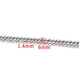 Detail macro view of 6mm wide and 1.4mm thick silver stainless steel Cuban link chain