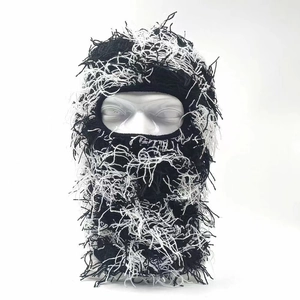 Black and white distressed knit balaclava mask with fringe and fuzzy texture for winter