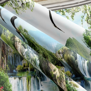 Detailed view of nature landscape tapestry fabric showing waterfall and eagle print