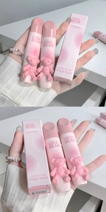 Close-up of Gege Bear matte lip glaze in soft pink with 3D bear on frosted tube