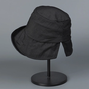 Detail of waterproof nylon sun hat featuring a split back brim for ponytail comfort