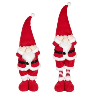 Red and white plush Christmas gnomes with knitted hats and white beards on white background